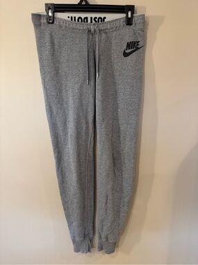 Nike Gray Joggers with Red Nike Tag